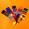 Latest design wholesale elastic soft coloured jacquard candy striped novelty fancy men women crew socks 3